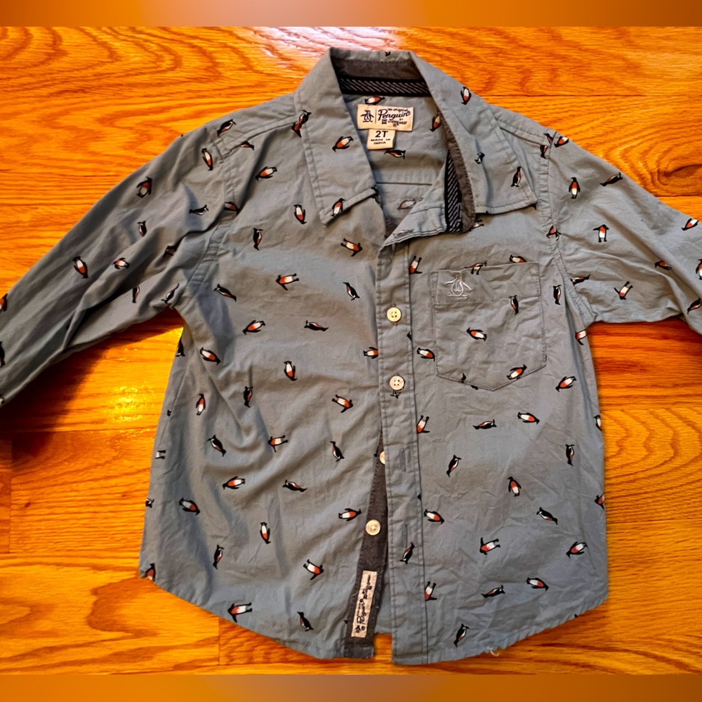 Penguin size 2T boys blue long sleeve collared shirt with penguins on it.